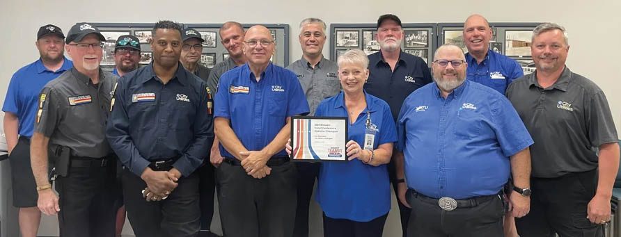 Group photo of bus operators being recognized for actions during storm