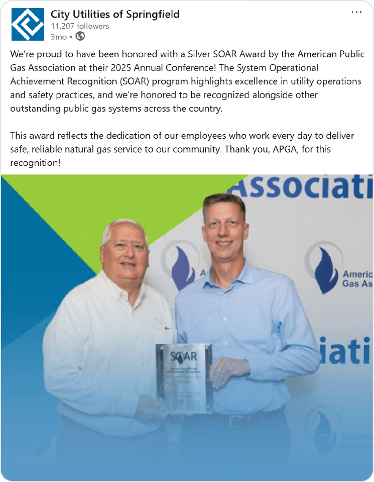 CU employee accepting award for Natural Gas Operational Excellence